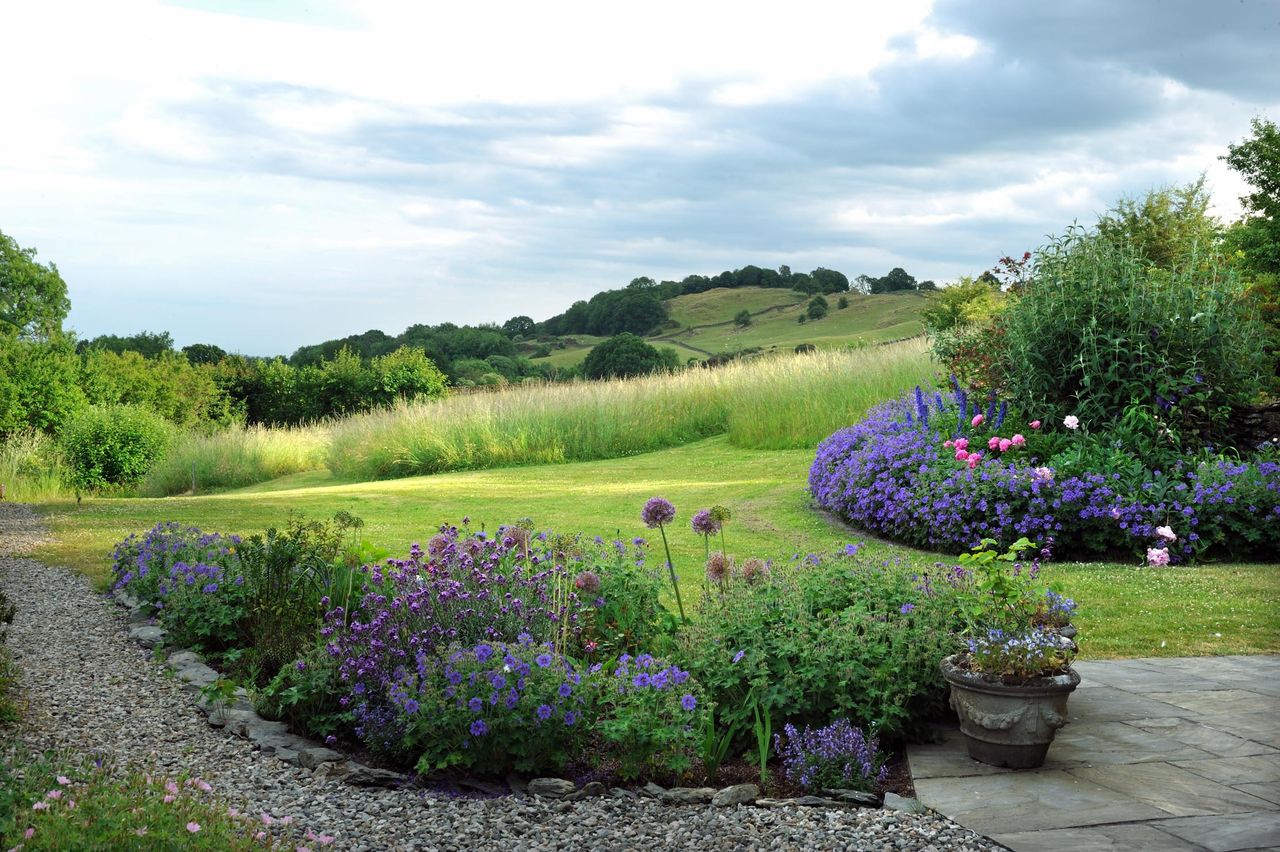 Nestled in the lee of a curving bank, the Low Crag garden is protected from the prevailing winds.