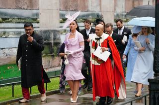 Katy Perry leaves Westminster Abbey following the coronation ceremony of King Charles III and Queen Camilla on May 6, 2023 in London, England