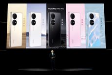 Huawei exec Richard Yu, onstage to reveal the company's latest handsets, the P50
