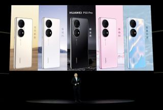 Huawei exec Richard Yu, onstage to reveal the company's latest handsets, the P50