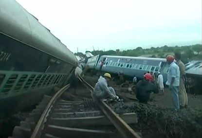 Two trains derailed moments apart in India on Tuesday night