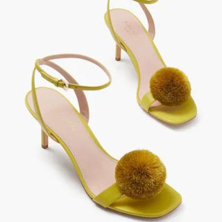 yellow pom pom shoe