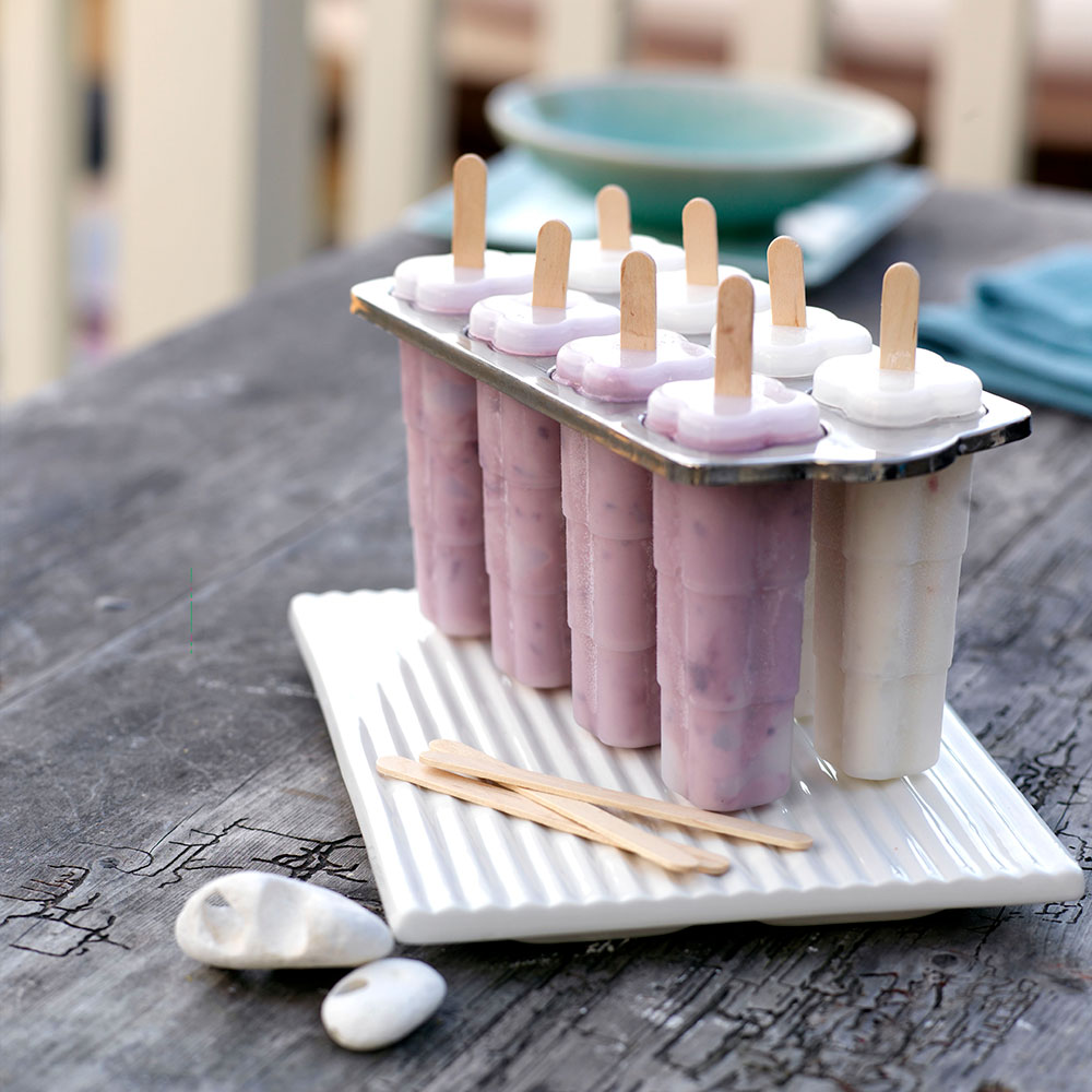 ice cream maker black wooden tablewith blur background