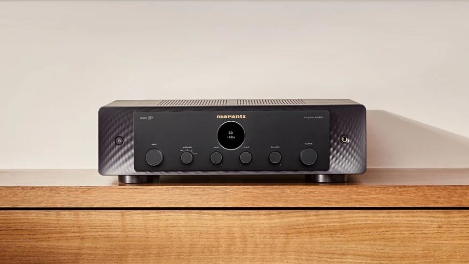 Marantz model 50 integrated amplifier on a wooden cabinet