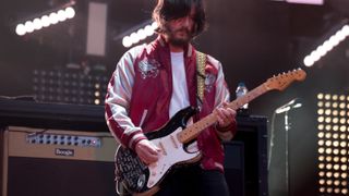 John Squire performs with the Stone Roses in 2017, shortly before they disbanded for a second time