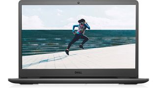 Product shot of Dell Inspiron 15 3000 laptop displaying an image of a woman running