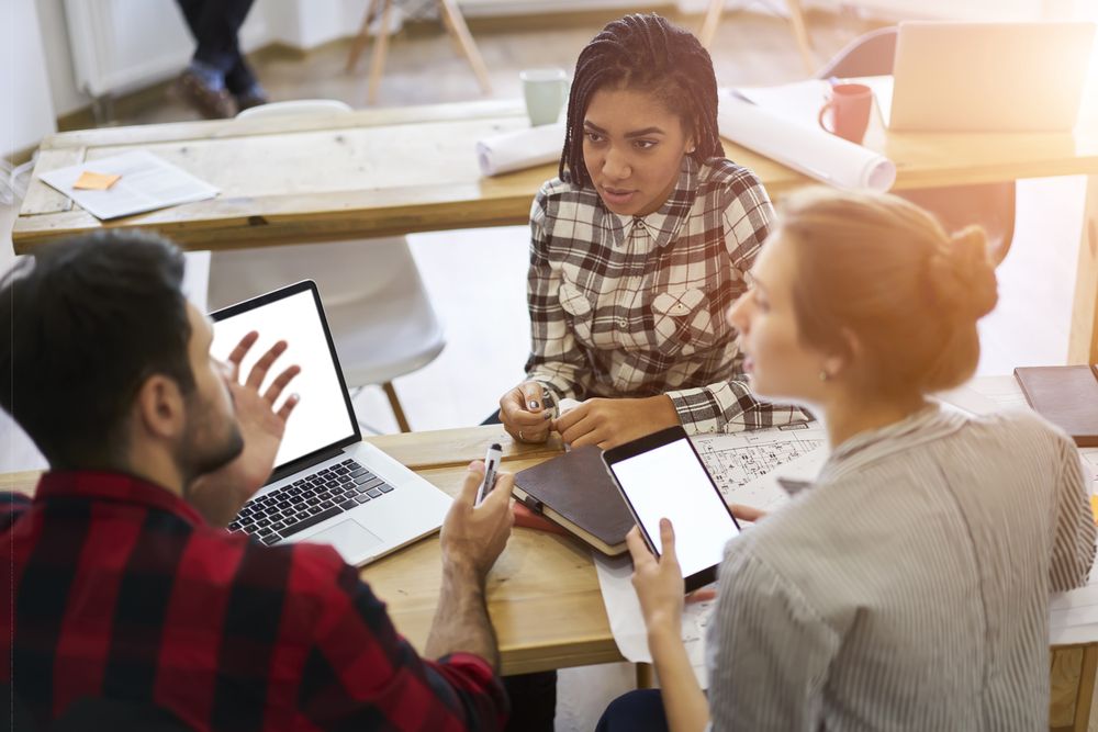 A group of students from a wide range of backgrounds taking up digital skills