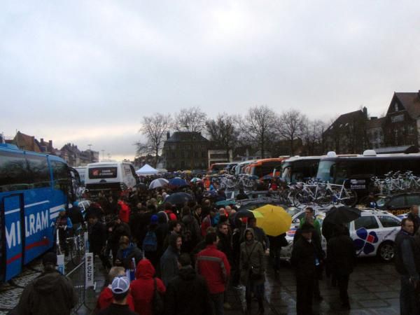 The organised chaos of the team enclosure at the start of Flanders
