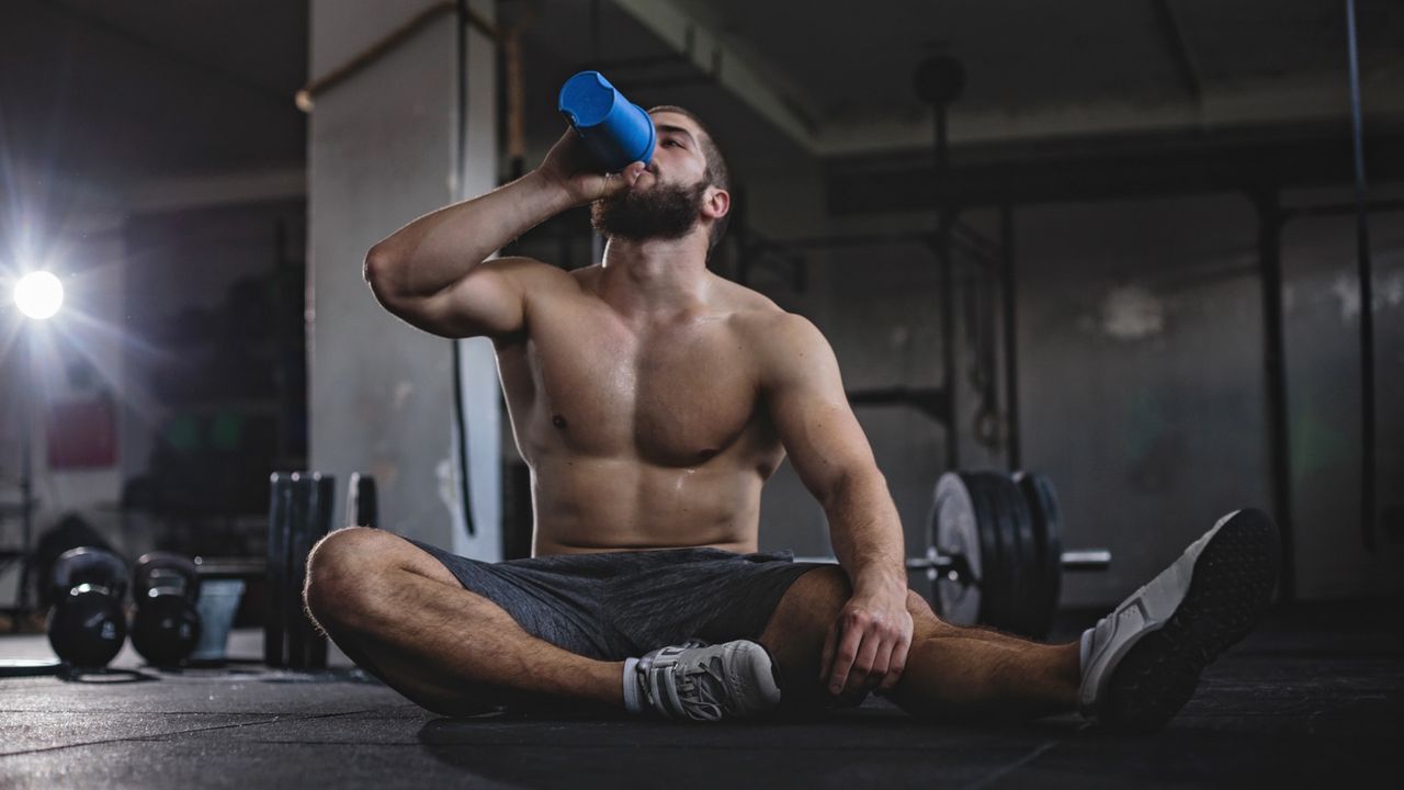 A man drinking a protein shake