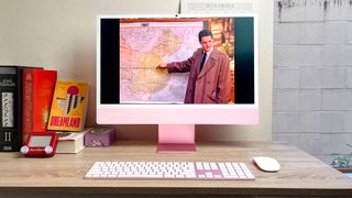 Apple iMac M4 review unit on desk playing Twin Peaks