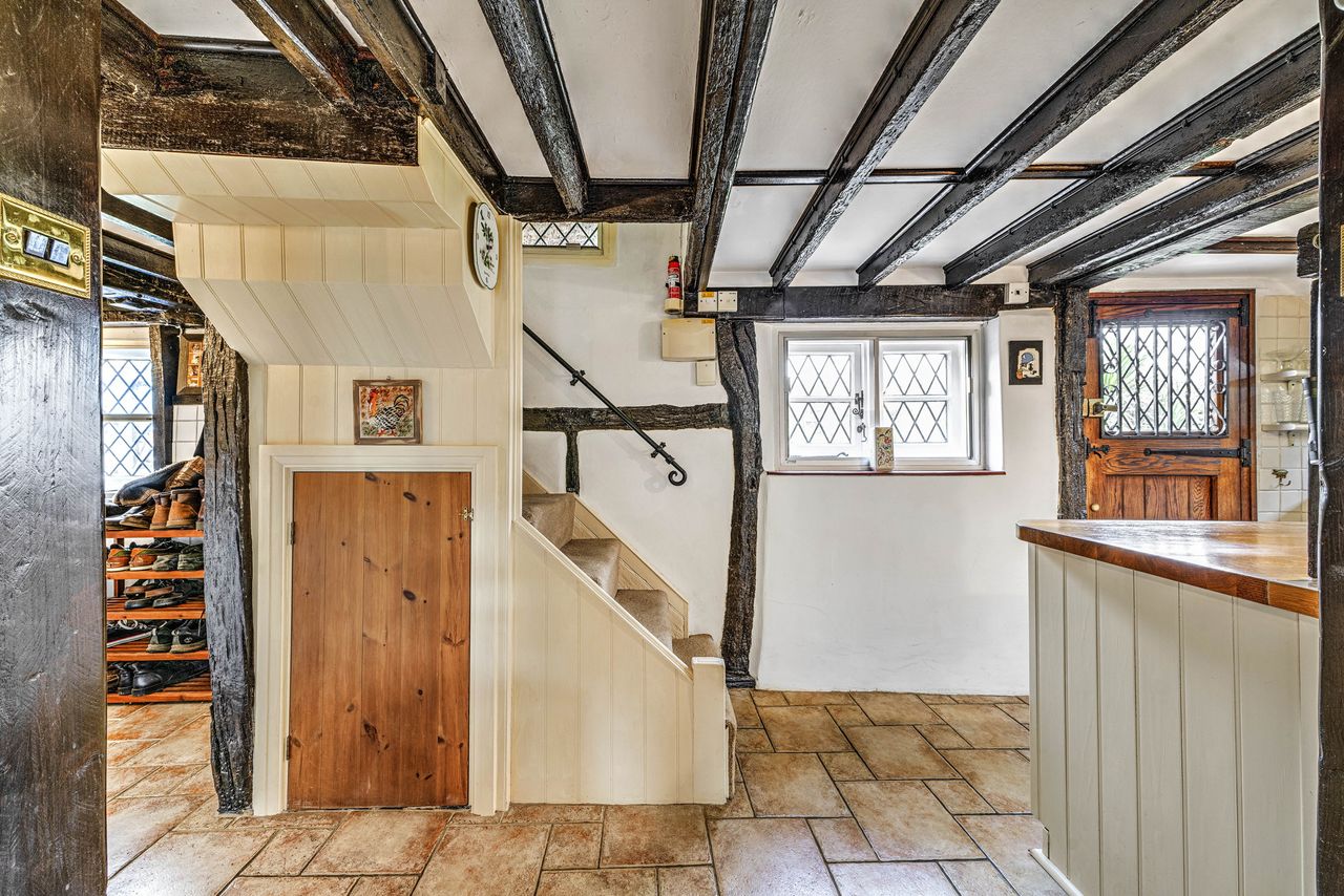 Images of the interiors and exteriors of The Thatched Cottage, Nutbourne
