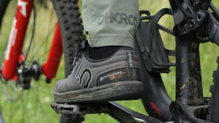 Ankle detailing showing logo on DHaRCO Mens Gravity pants