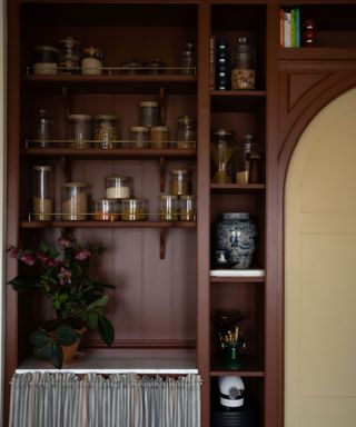 red pantry with open shelving