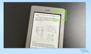 Kindle open at a page showing the bookmark icon