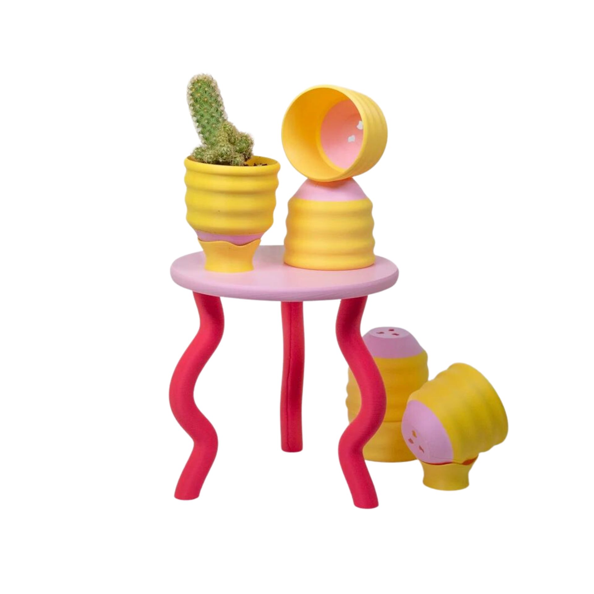 Berdiri tanaman bergelombang merah dan merah muda dengan tanaman pot