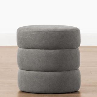 A small gray ottoman from McGee & Co.