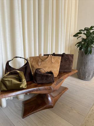 An image of different liffner bags on a bench.