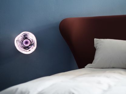 Inside Mua Mua Hotel designed by Tom Dixon for Milan Design Week 2026, featuring Tom Dixon x Vispring bed collaboration