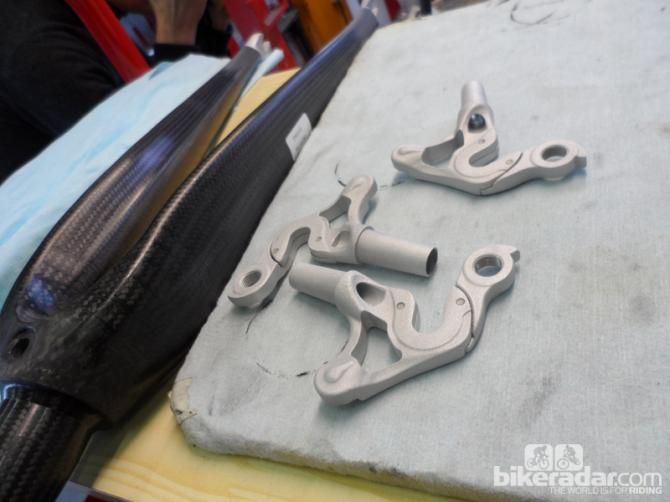 Post-moulding, the frames are taken to have their fittings and fixtures bonded in, and the two halves are bonded together