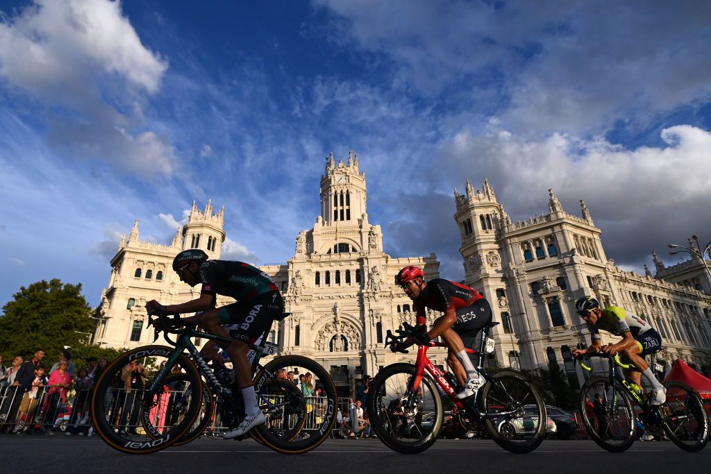 MADRID, SPAIN - SEPTEMBER 17: (L-R) Lennard K&amp;auml;mna of Germany and Team BORA - Hansgrohe, Filippo Ganna of Italy and Team INEOS Grenadiers and Rui Costa of Portugal and Team Intermarche&amp;#769; - Circus - Wanty compete in the breakaway passing through Cibeles Plaza with the Madrid City &amp;#8203;&amp;#8203;Hall in the background during the 78th Tour of Spain 2023, Stage 21 a 101.5km stage from Hip&amp;oacute;dromo de la Zarzuela to Madrid. Paisaje de la Luz / #UCIWT / on September 17, 2023 in Madrid, Spain. (Photo by Tim de Waele/Getty Images)