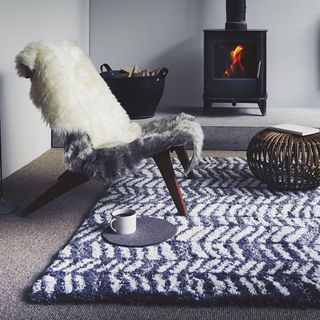 grey rug with fireplace