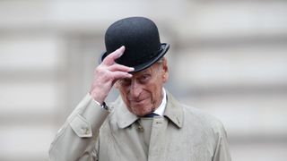 london, england august 2 prince philip, duke of edinburgh raises his hat in his role as captain general, royal marines, makes his final individual public engagement as he attends a parade to mark the finale of the 1664 global challenge, on the buckingham palace forecourt on august 2, 2017 in london, england photo by yui mok wpa poolgetty images
