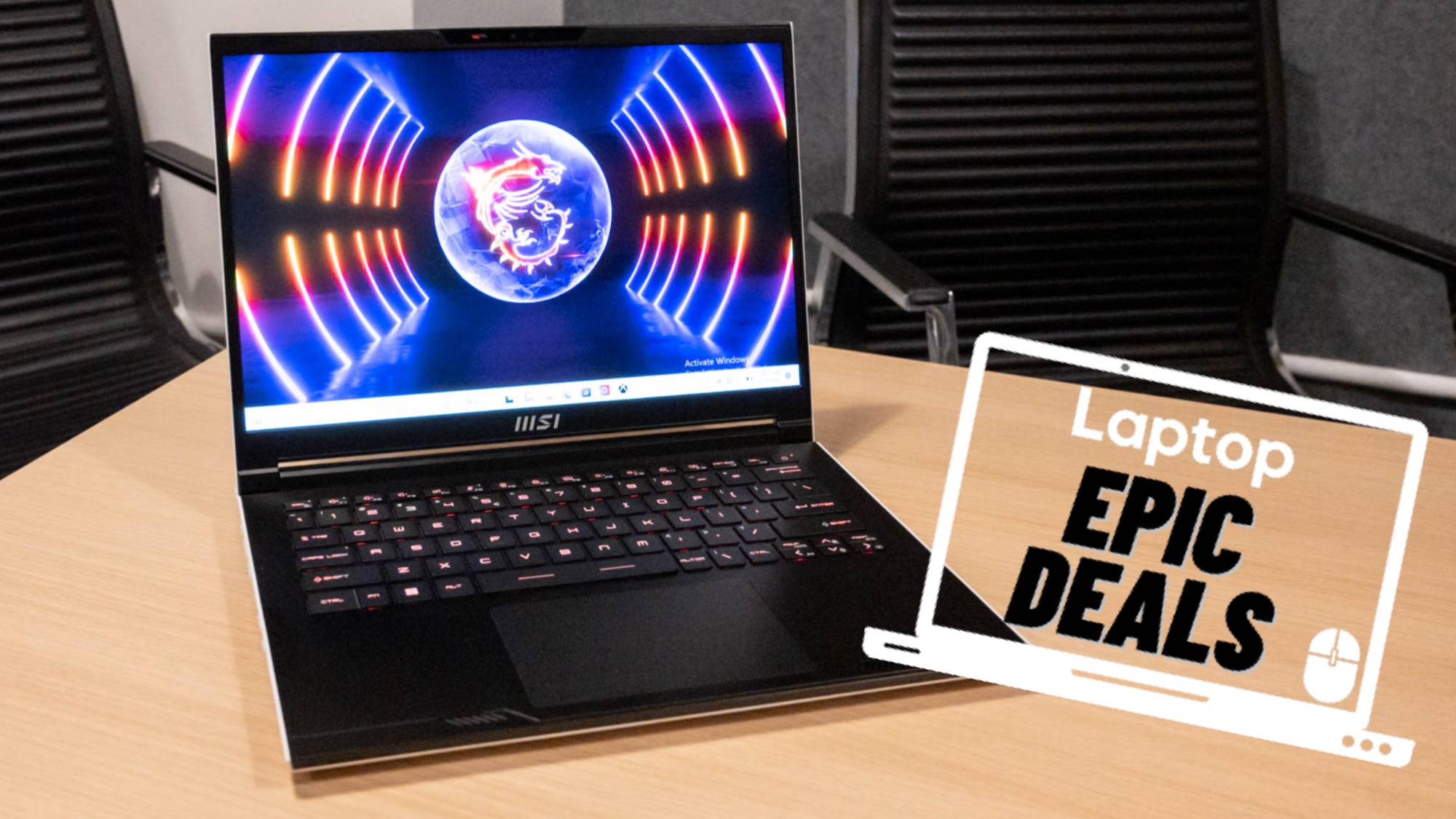 MSI Stealth Ai gaming laptop on a wooden table with epic deals badge and black chair in the background