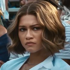 Zendaya in character as Tashi Duncan at a tennis match in a story about her character using Augustinus Bader skincare