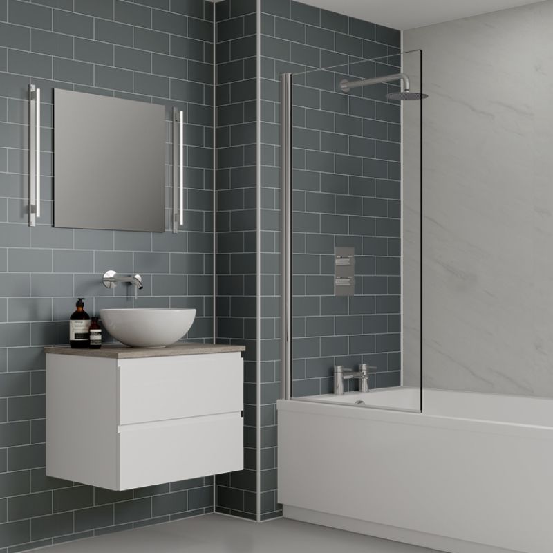 A bathroom with grey subway tiles effect shower panels 