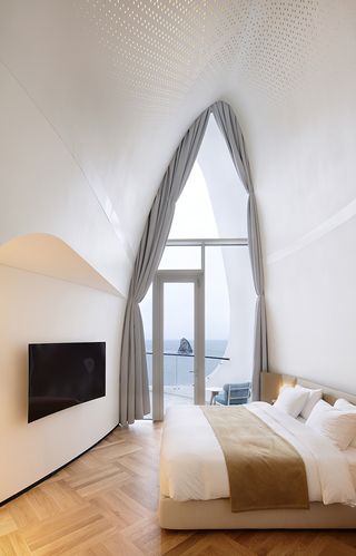 Guestroom with floor to ceiling window