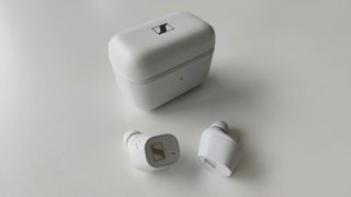 Sennheiser CX Plus True Wireless review: white headphones on a desk
