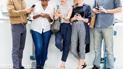 Group of people all on their phones