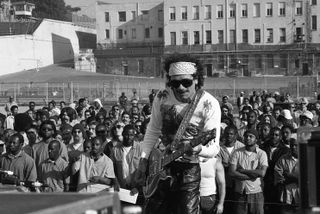 Carlos Santana peforms at San Quentin State Prison on December 10, 1988