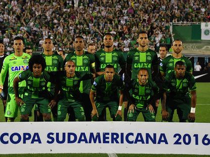 Brazil's Chapecoense players pose for pictures during their 2016 Copa Sudamericana semifinal second leg football match against Argentina's San Lorenzoheld at Arena Conda stadium, in Chapeco, 