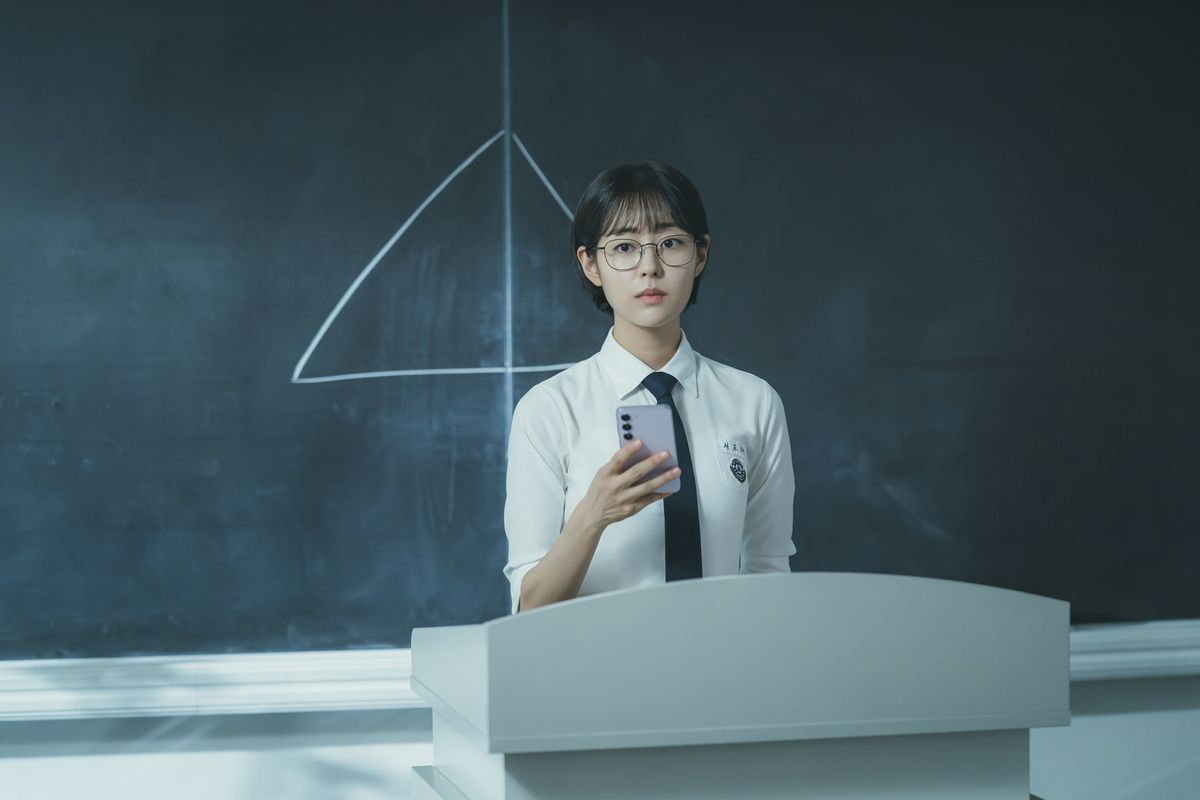 Pyramid Game promo image featuring a student standing in front of a pyramid drawing