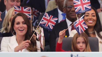 royal eurovision Catherine, Duchess of Cambridge and Princess Charlotte of Cambridge during the Platinum Party at the Palace in front of Buckingham Palace on June 04, 2022 in London, England. 