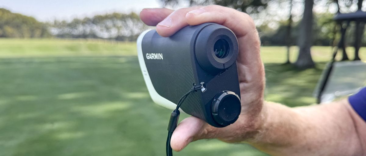 Holding the Garmin Approach Z30 rangefinder