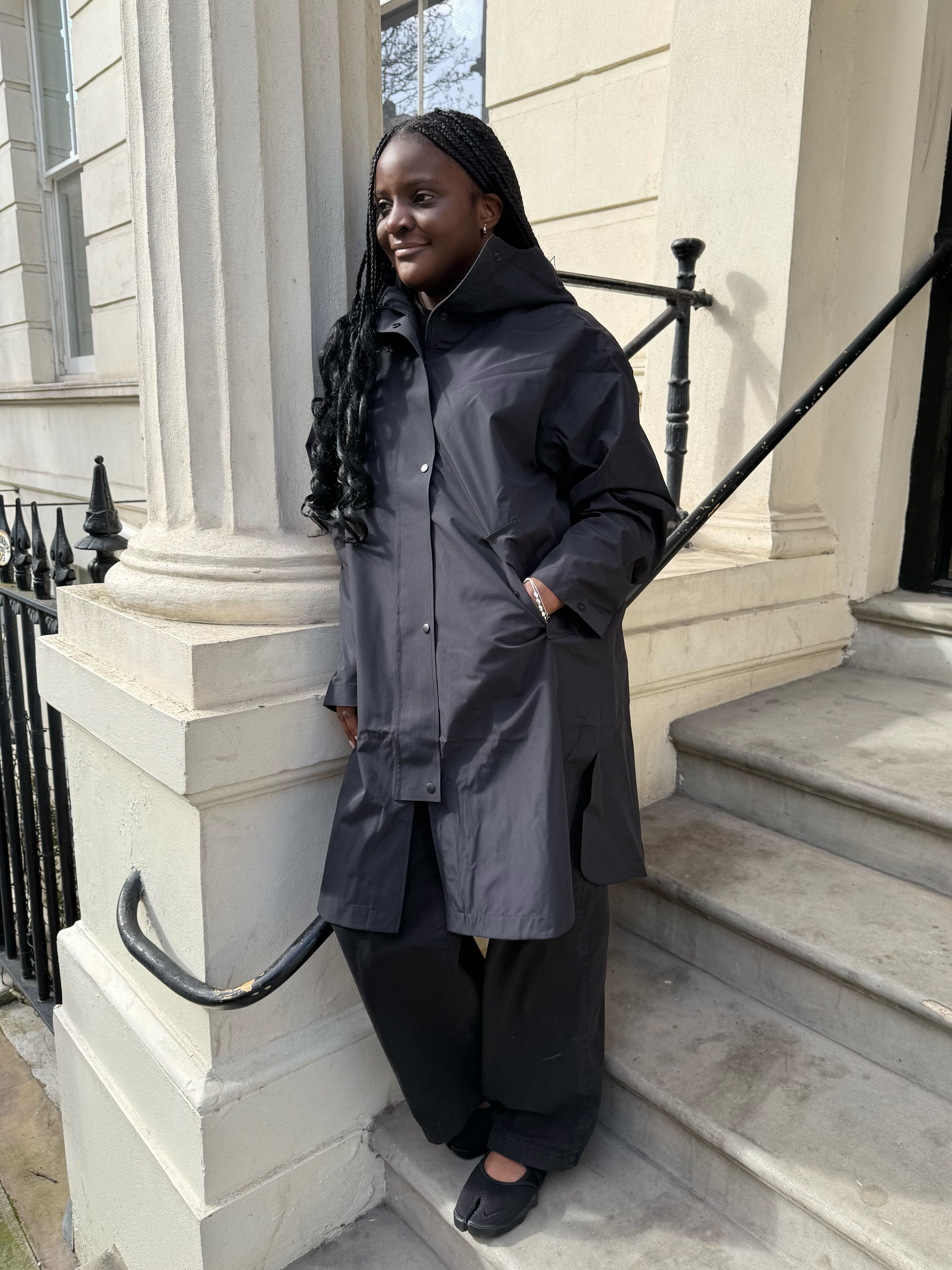 An image of Who What Wear UK junior writer Brittany Davy wearing a H&amp;amp;M raincoat.