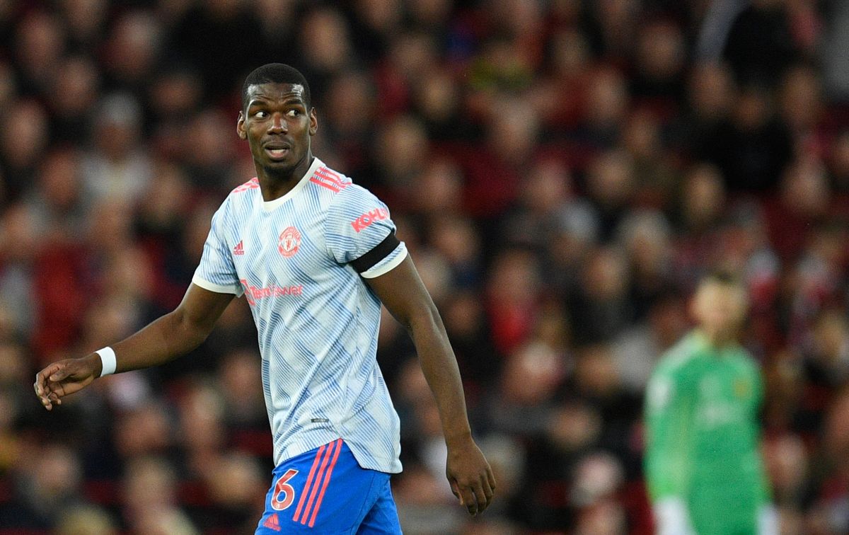 Manchester United midfielder Paul Pogba walking