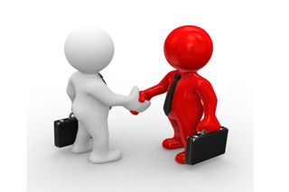Business figures shaking hands