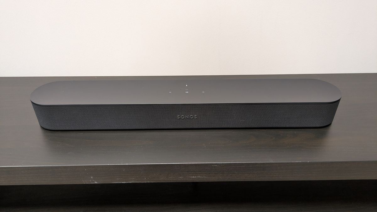 Sonos Beam on dark wood stand