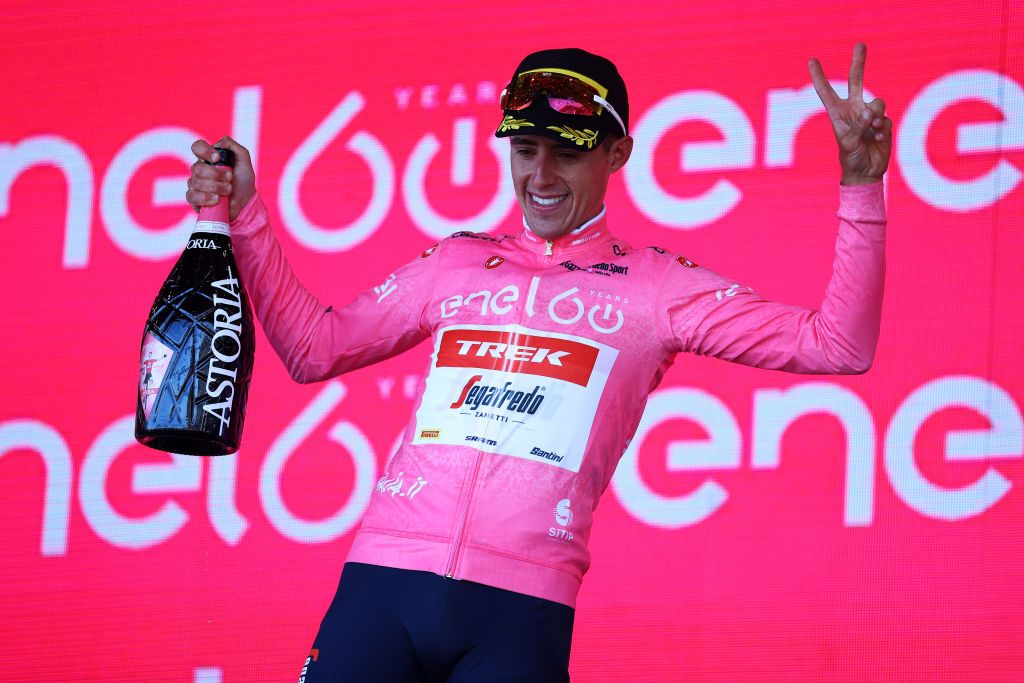 ETNA PIAZZALE RIFUGIO SAPIENZA ITALY MAY 10 Juan Pedro Lpez of Spain and Team Trek Segafredo celebrates at podium with champagne as Pink Leader Jersey winner during the 105th Giro dItalia 2022 Stage 4 a 172km stage from Avola to Etna Piazzale Rifugio Sapienza 1899m Giro WorldTour on May 10 2022 in Etna Piazzale Rifugio Sapienza Italy Photo by Michael SteeleGetty Images
