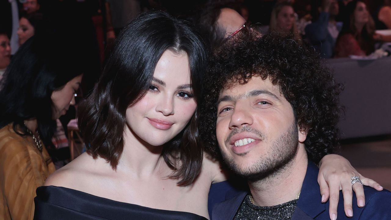 Selena Gomez in a black dress and Benny Blanco in a black glittery top and navy blazer at the Second Annual Rare Impact Fund Benefit Supporting Youth Mental Health in October 2024