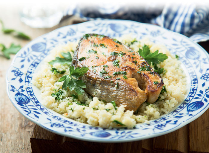 Fried salamon with couscous and fresh herbs
