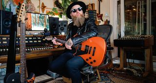 Skindred’s Mikey Demus with his new Manson signature, the MD-3
