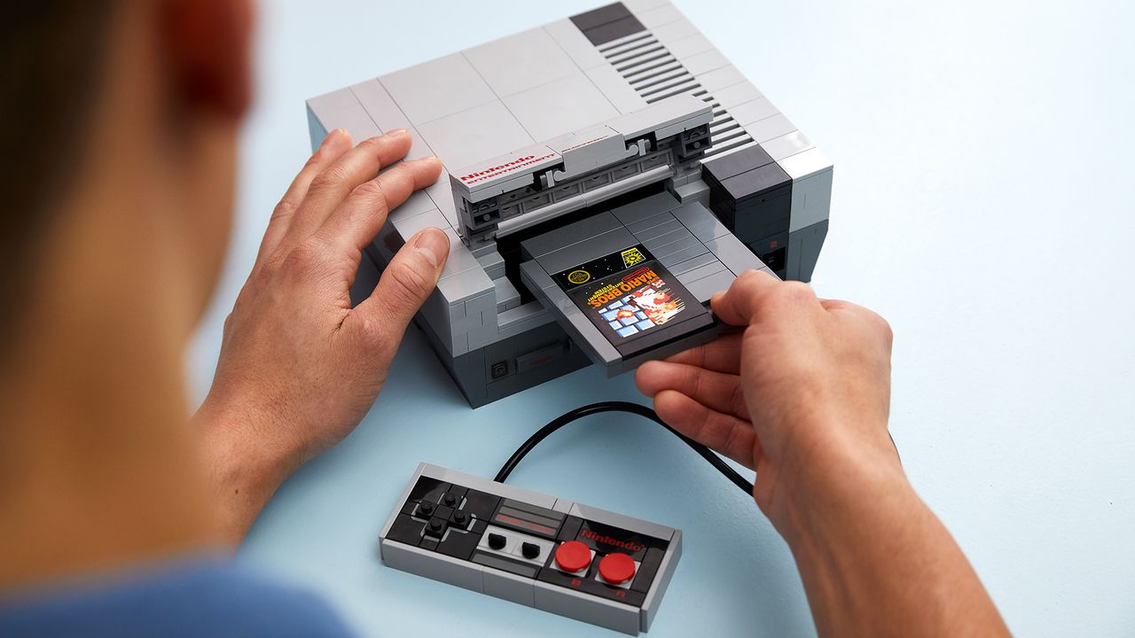 Yes, you can insert the Lego-built Mario cartridge in to the Lego NES, before fiddling with the Lego controller.