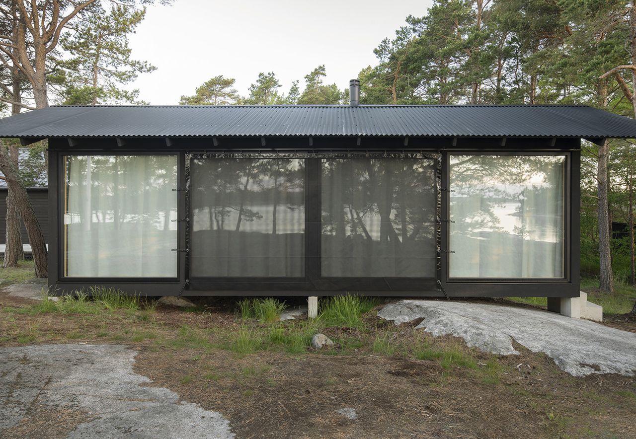 glass walls in Swedish A House cabin