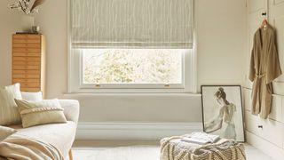 Neutral bedroom with blinds at the window use when looking to cool down the room without ac
