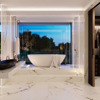 bathroom with white wall and bathtub