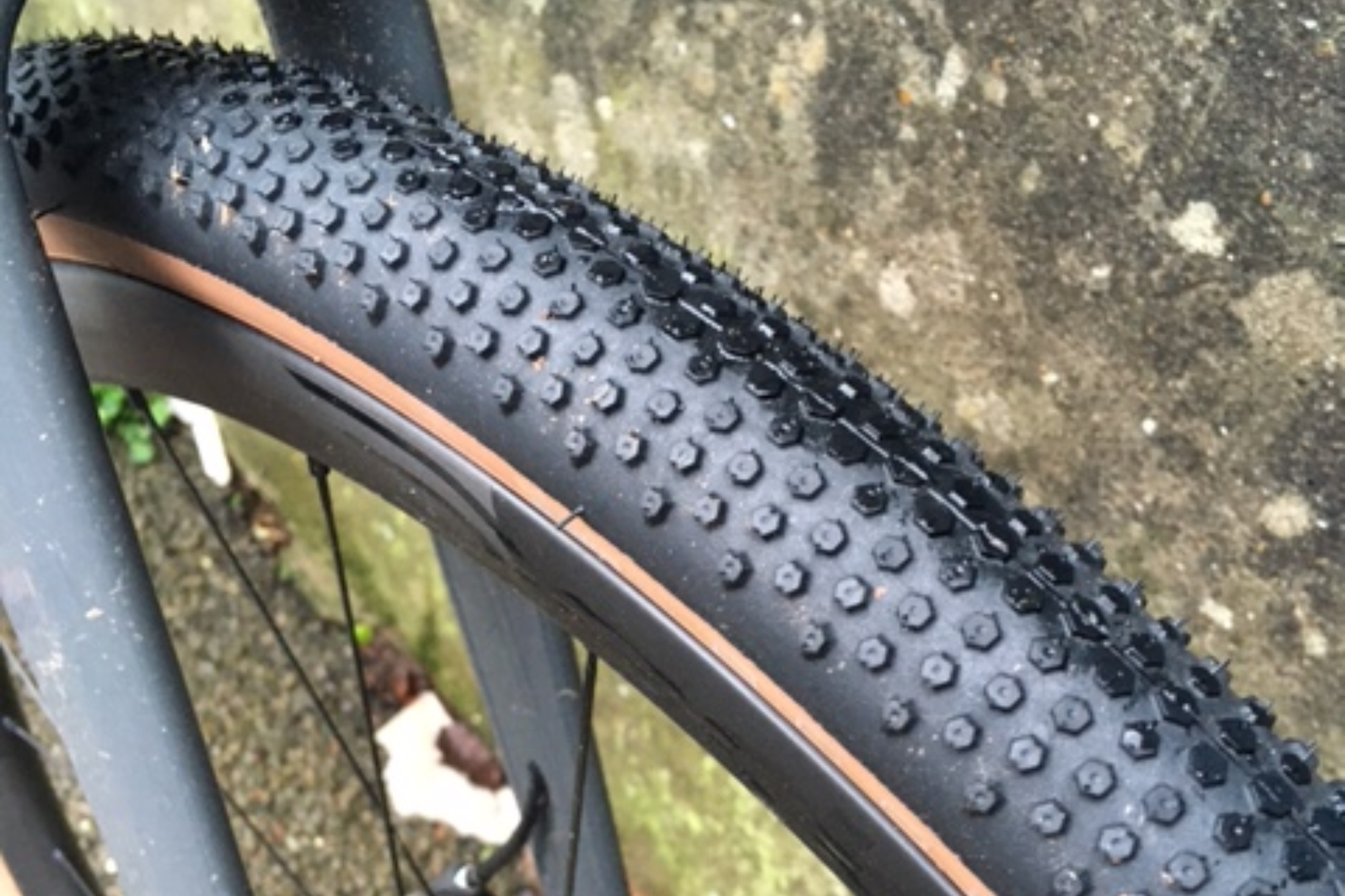 Image shows tread pattern of the American Classics Aggregate gravel tire